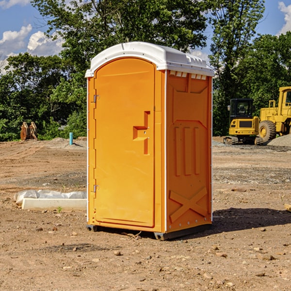 how often are the portable restrooms cleaned and serviced during a rental period in Maple River Michigan